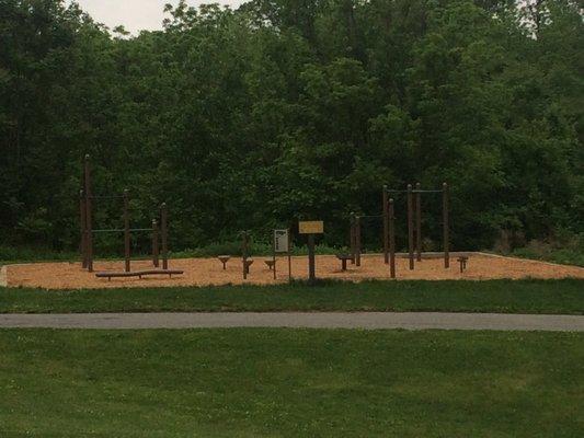 Monkey bars, pull-up bars, balance beams and stretching stations