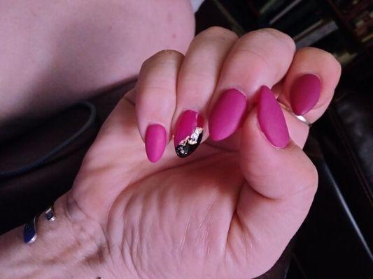 Mey did awesome matte nails with gold foil accent.  envy nail salon.