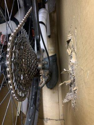 Nice, zero protection for my derailleur or rear dropouts! Note the shredded cardboard from the derailleur and rear QR.