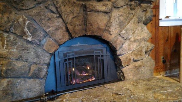 gas insert - recessed into arched rock opening