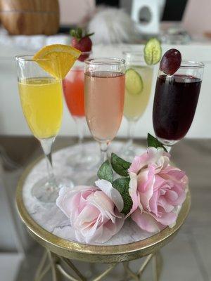 ALL OUR DRINKS! MIMOSA, ROSÉ, SANGRIA, LIME MARGARITA, STRAWBERRY MARGARITA :) complimentary with service upon request.