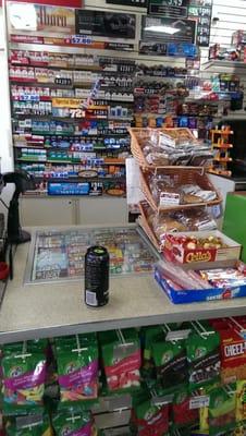 The front counter with the smokes in the back!!! Ex smoker here!!