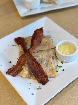 Eggs, bacon, bell peppers and cheese crepe