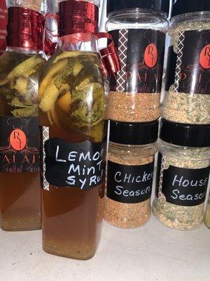 Products for purchase. Palais House seasoning, Chicken seasoning, Garlic Herb infused oil and Lemon Mint simple syrup.