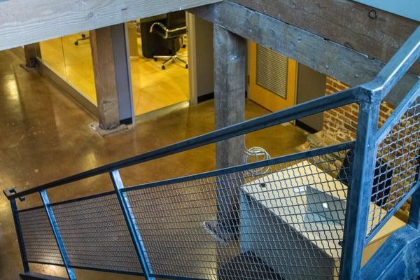 Yes, the studio is under ground! But you will be extremely surprised once you walk down the custom stair case.