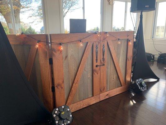 The DJ booth setup on the day of the wedding. Super rustic and awesome.