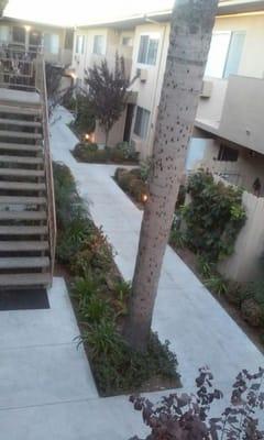 Inside the courtyard area of Ramona Palms, nice landscaping