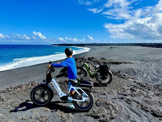 "Discover a lava-formed black sand beach on our thrilling E-Bike adventure!"