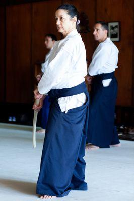 Chief Instructor and Dojo-cho Marsha Turner, instructor Andrew Vitale and another student attending a sword seminar.