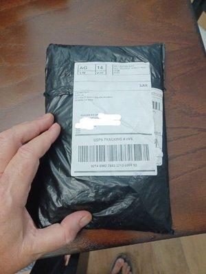 Very small package for a big shirt!