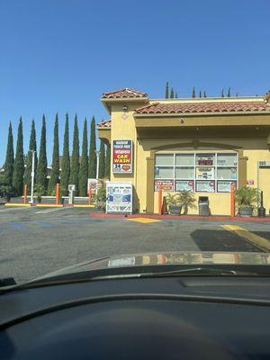 Cheap drive thru touch free car wash at 76 gas station