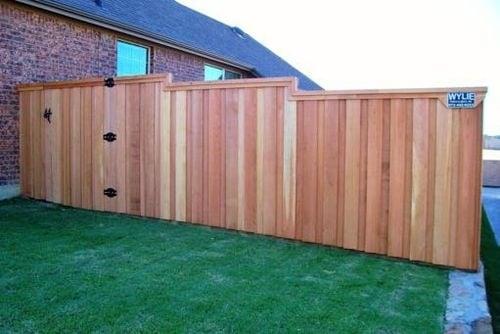 Stepped cedar fence