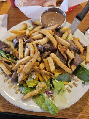 Pittsburgh steak salad with homemade balsamic dressing ( this is a half size salad)  plenty to eat!