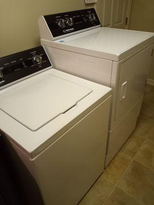 Raised dryer with pedestal to not have to bend down lower than I have to, to take clothes out of dryer since washer is top load.