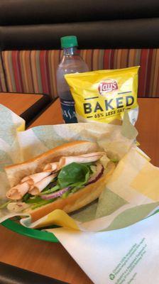 6 inch Italian bread  50% more meat Turkey  Lettuce  Spinach  Onions  Green peppers  Baked lays chips