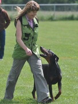 Owner and head trainer Maureen and her happy Doberman Aisin.