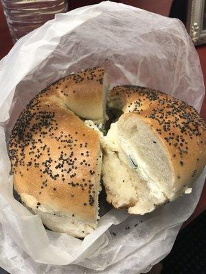 Poppyseed bagel with scallion cream cheese