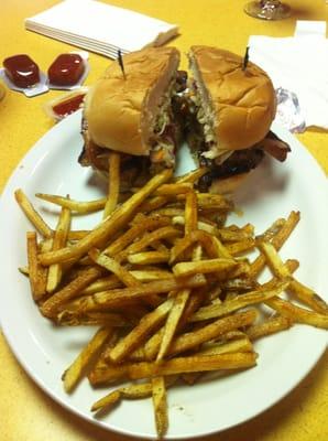 Brisket,pork belly and slaw sandwich.