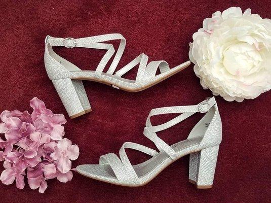 Sparkly silver block heels are perfect for an outdoor wedding!  Size: 8-1/2 Wear Status: New!  Heel Height: Under 3"