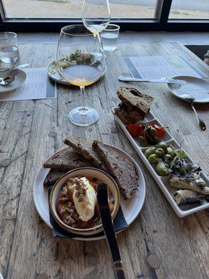 Quark with warm peaches and pecans, served with a nutty bread, alongside the tinned fish with sweet peppers, olives and caper berries.