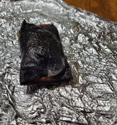 This was the Spam Musubi that the vendor made. Nothing like the picture, the spam was hard and burnt.