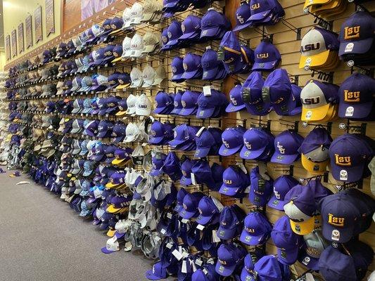 The wall of LSU caps...