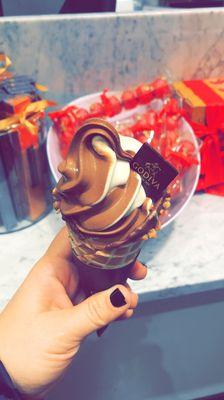 Swirl ice cream in chocolate almond waffle cone