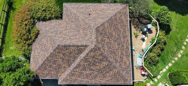 Close-up of a roof in Waynesville, Ohio with newly installed CertainTeed Landmark Pro AR Max Def Burnt Sienna shingles.