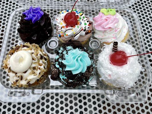 (Left to Right) Carrot Cake with Nuts, Raspberry Filled, Mint Oreo, Ice Cream Sundae, Pina Colada Cupcake, Strawberry Shortcake Cupcake