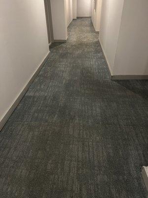 Soiled hallway carpet