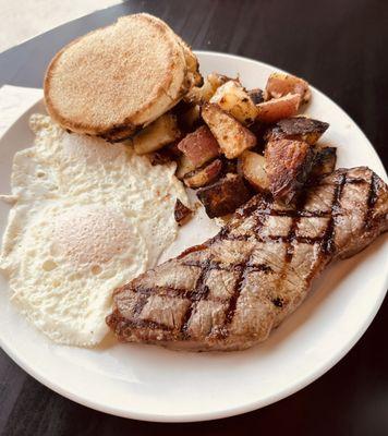 Steak & eggs with home fries and english muffin. Awesome breakfast!!