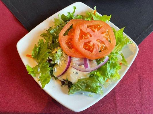 Salad that accompanies the entree. Excellent homemade blue cheese dressing.