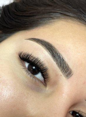 Dark brown brow tinting