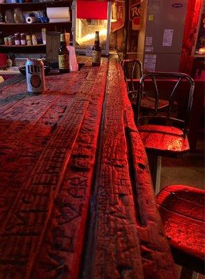 The well worn bar and stools