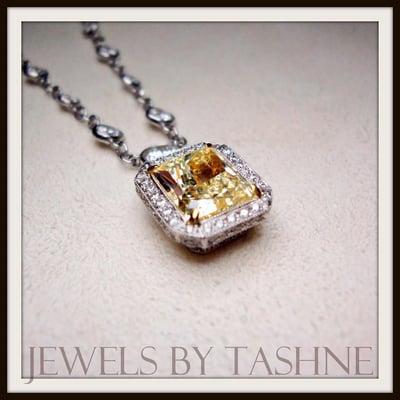 Last but surely not least,"Yellow Diamonds in the Sky!!" I think yes! Gorgeous Cushion Cut Yellow Diamond pillowed by diamonds!