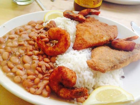 Fried fish & shrimp w/ rice and beans. The fish had no taste and the shrimp were ok. The beans and rice were the best part.