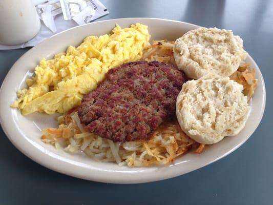 Breakfast plate (overcooked eggs and dried out biscuit)