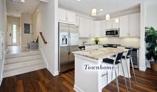 Madison townhome kitchen features breakfast bar