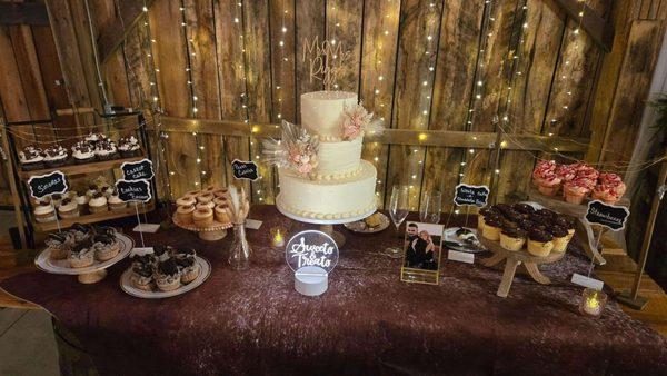 Wedding cake and cupcakes