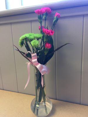 Fresh flowers on table.