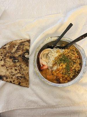 A mixture of the food we ordered, and paan bread to the left. It's traditional bread ate with Indian food. So so good