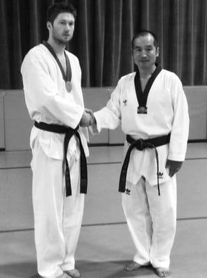 Paul Millholen at a self defense seminar with his Grand Master and world renown author and creator of MBX-12