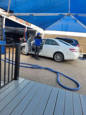 Car getting vacuum and washed