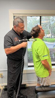 Neck adjustment using arthrostim