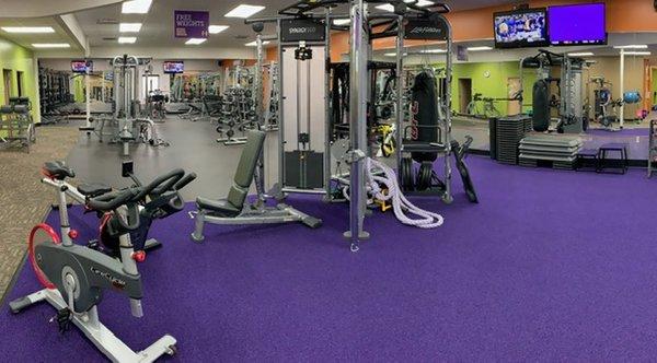 Purple turf area, another cable station, power pivot, ropes, punching bag, dip station and step/plyo station.