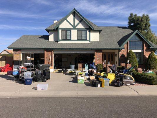 We clear the garage of all items and place them in the driveway/