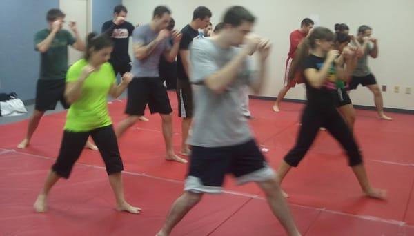 Revolution BJJ's Muay Thai Kickboxing Fundamentals Class, a great place to start learning kickboxing if you're in Richmond