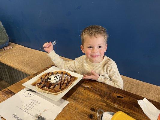 Son and his chocolate pancake