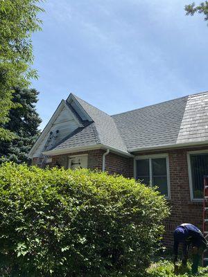 Old slate roofing removed. New architectural shingles installed.