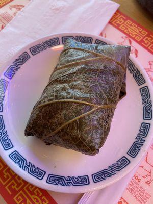 Sticky rice with chicken and mushrooms in lotus leaf $5